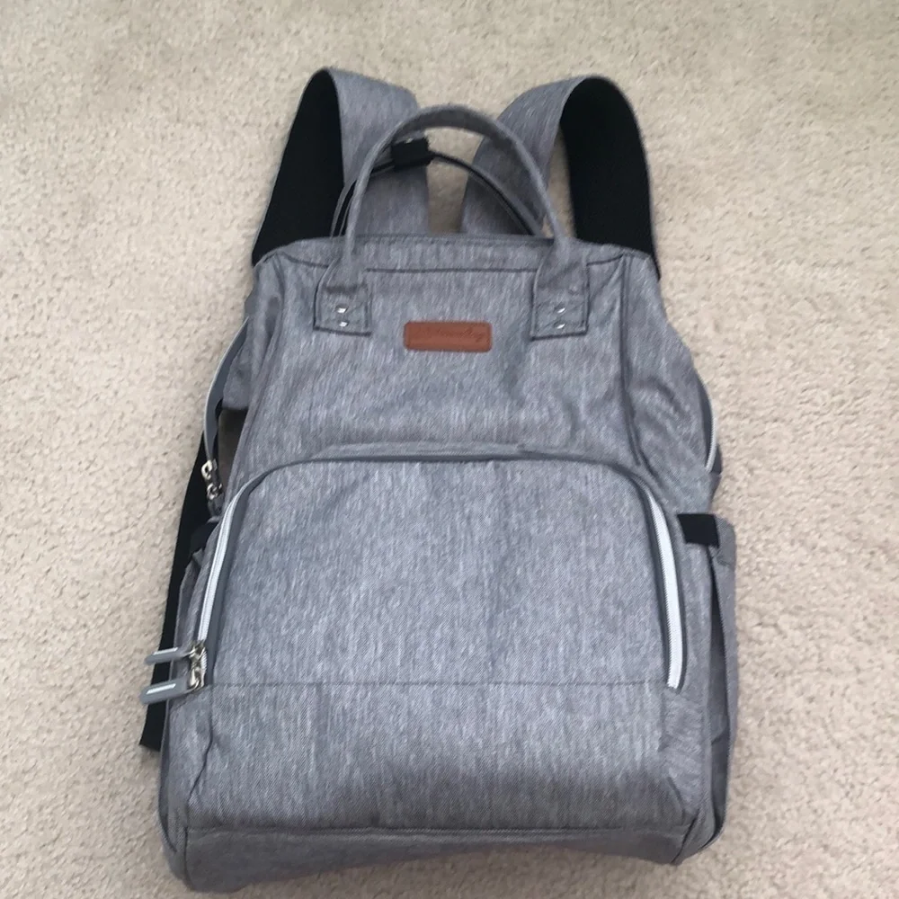 Baby changing gray backpack with multiple pockets